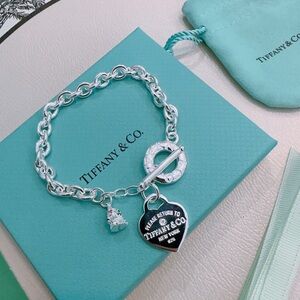 Tiffany & Co. Sterling Silver Heart Tag Charm Bracelet with Blue Pouch Accent